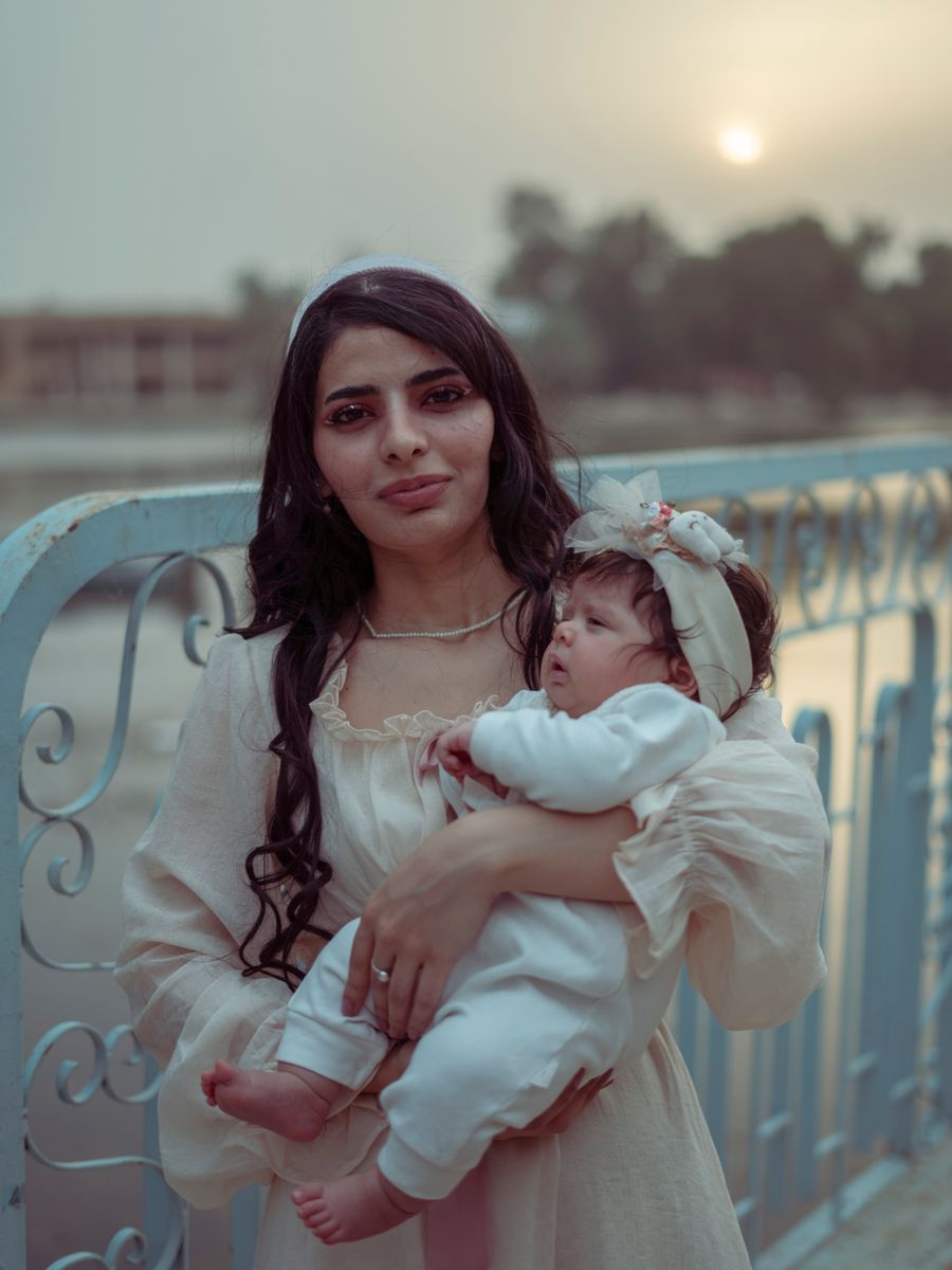 A mother holding her newborn